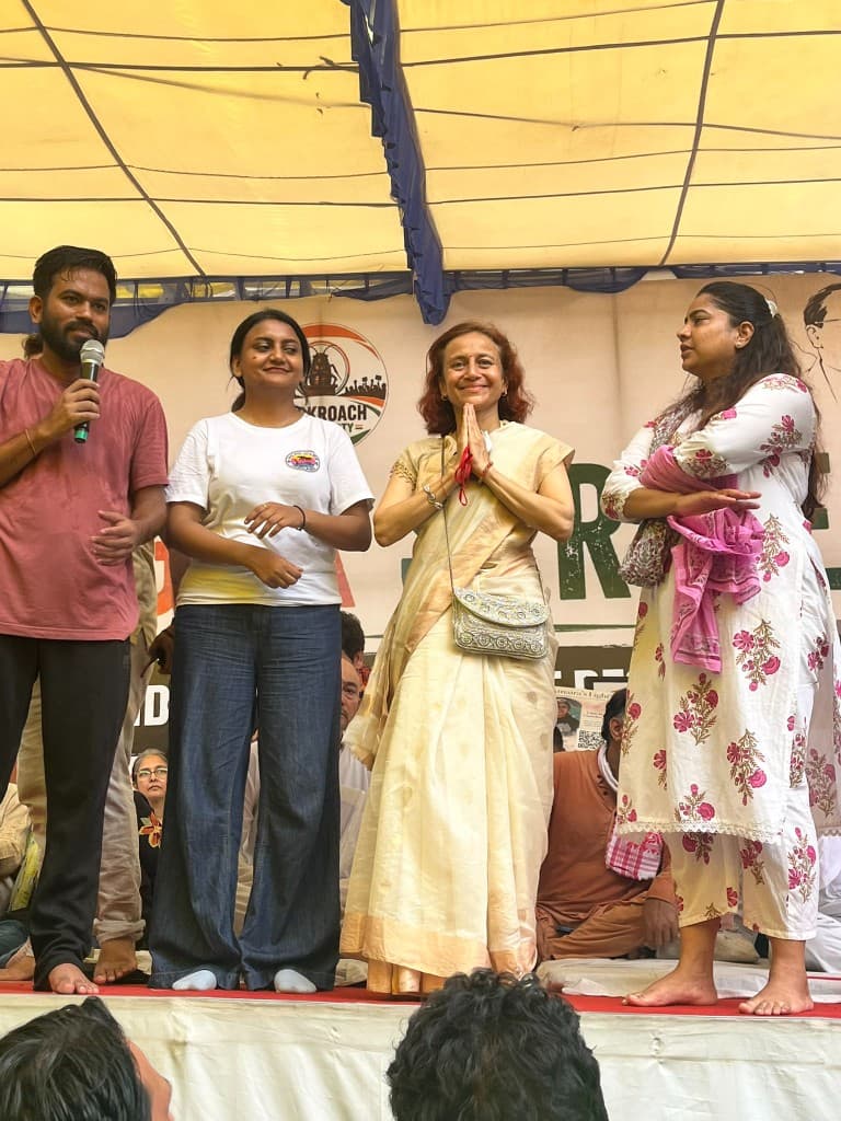 Arundhati Roy on stage at a Cockroach Janta Party gathering